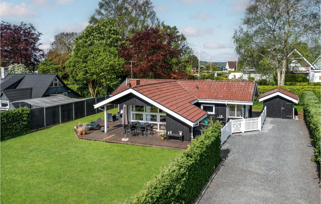 an aerial view of a house with a yard at Lovely Home In Hejls With Sauna in Hejls