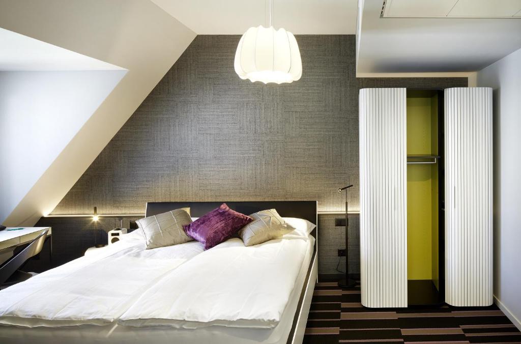 Postel nebo postele na pokoji v ubytování Hotel Continental Park