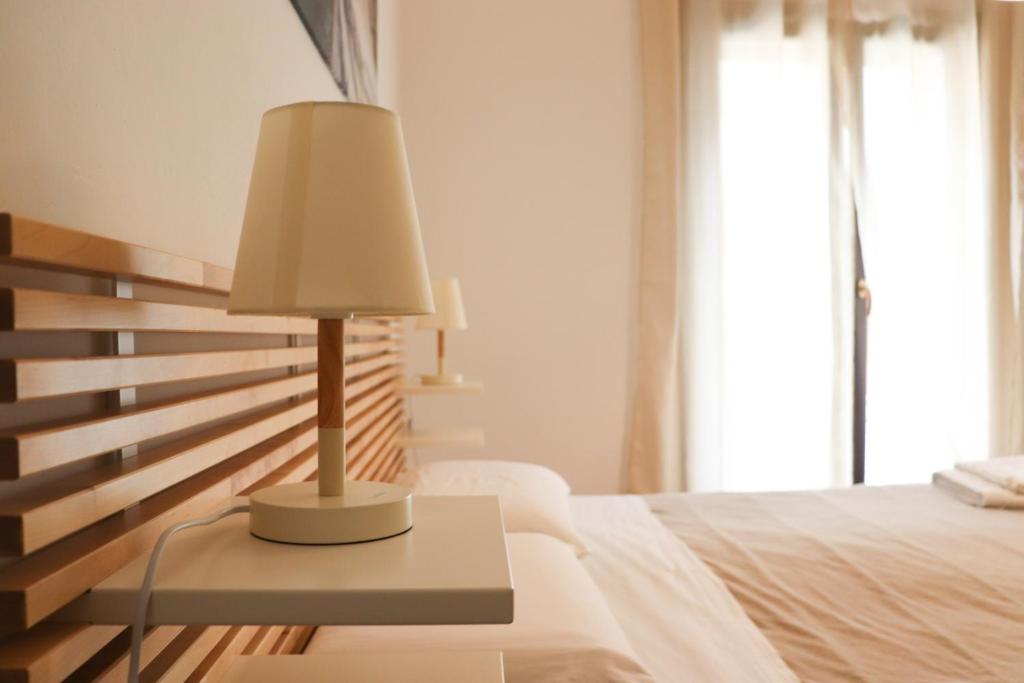 Posteľ alebo postele v izbe v ubytovaní Appartamenti-Residence Al Massimo