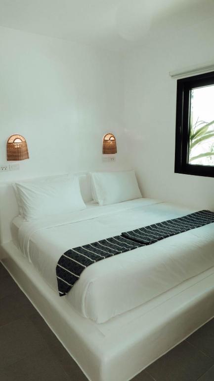 Postel nebo postele na pokoji v ubytování Hostel Bajala Siargao