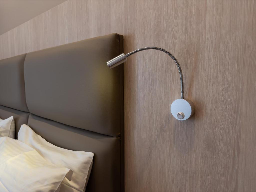 Postel nebo postele na pokoji v ubytování Anemoni Piraeus Hotel
