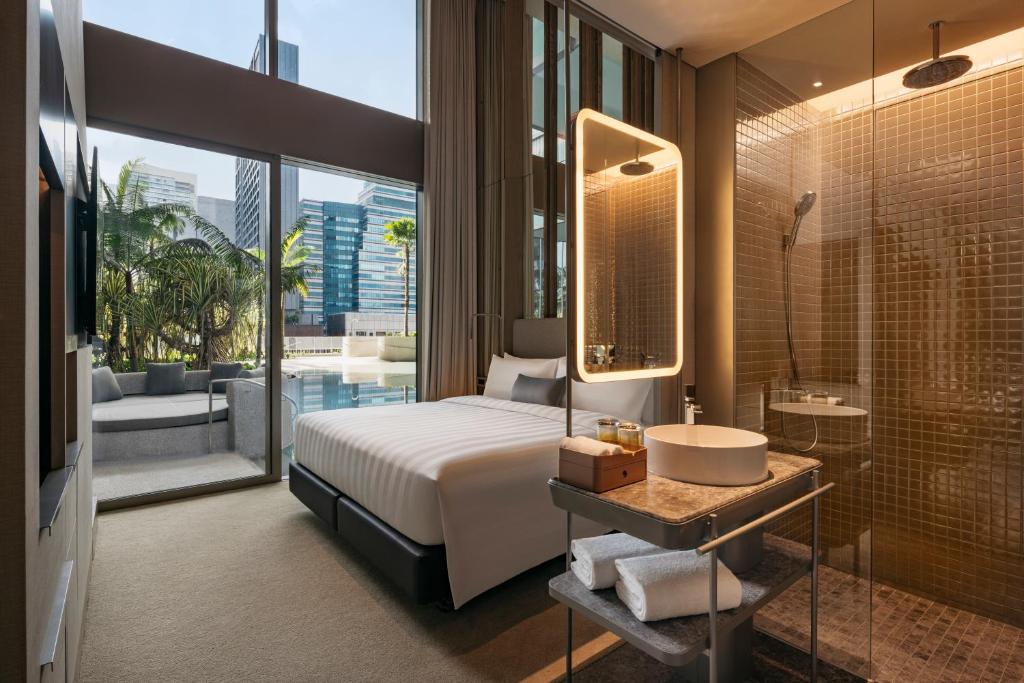 Giường trong phòng chung tại Pan Pacific Orchard