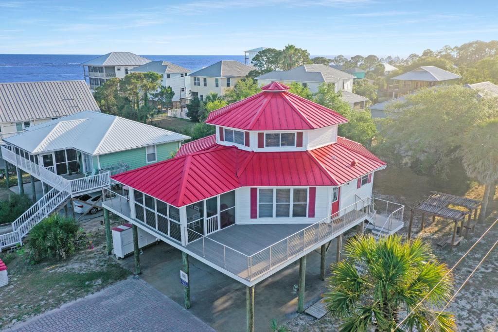 an overhead view of a house with a red roof at DeLight House by Pristine Properties Vacation Rentals in Indian Pass