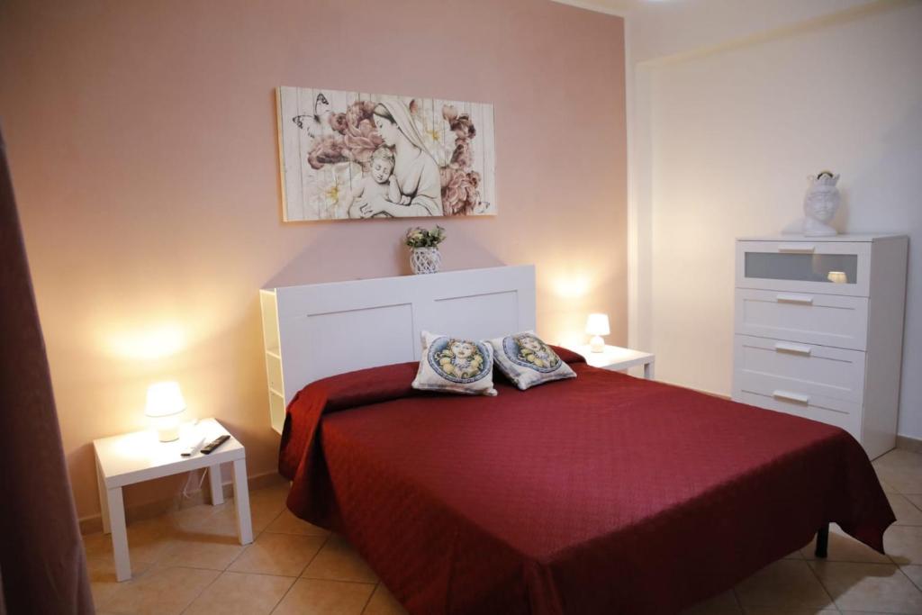 Postelja oz. postelje v sobi nastanitve Amecasa - Casa Vacanze Sicilia
