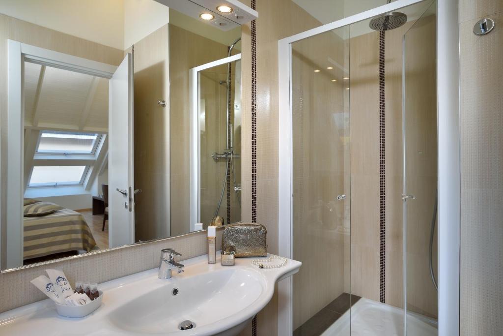 Kúpeľňa v ubytovaní Astor Hotel