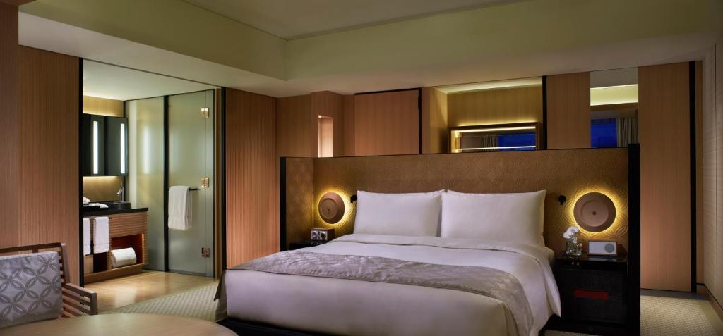 Postel nebo postele na pokoji v ubytování The Ritz-Carlton Kyoto