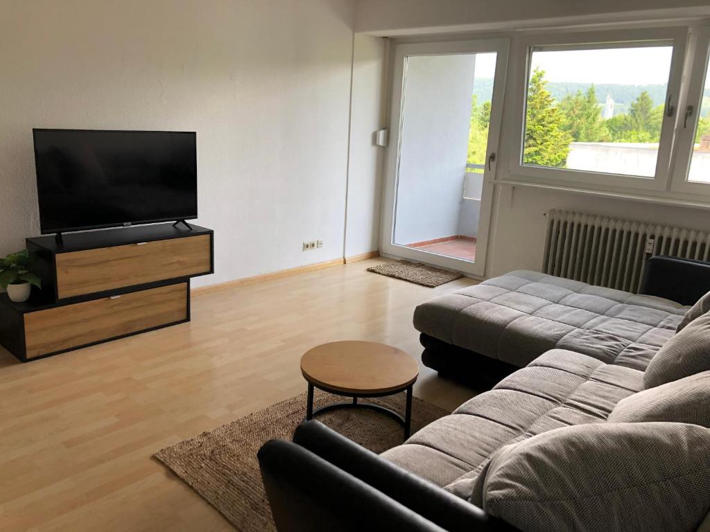 TV a/nebo společenská místnost v ubytování Ferienwohnung am Grütt