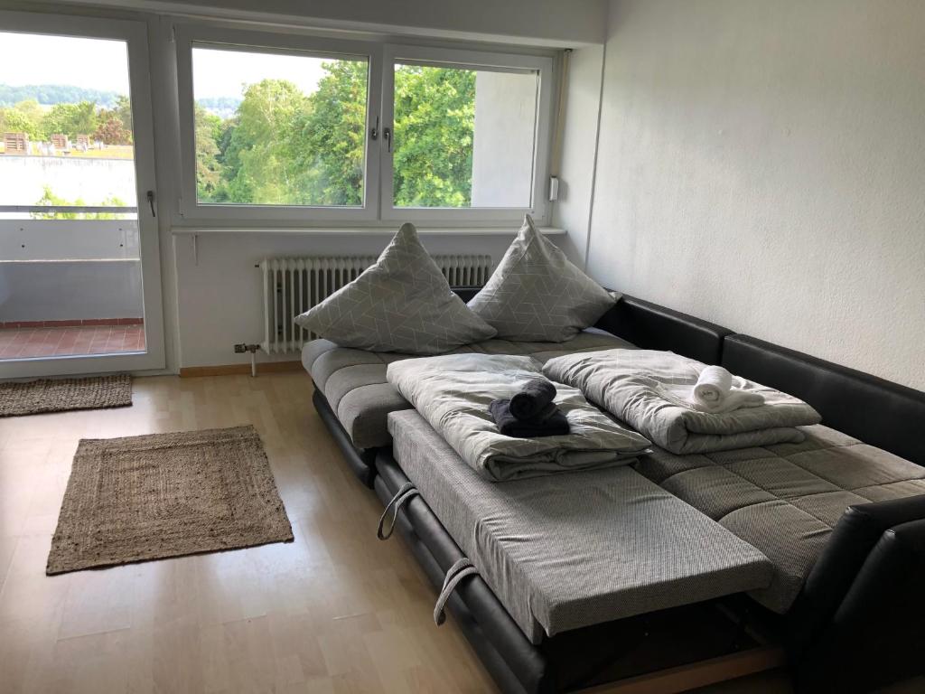 Postel nebo postele na pokoji v ubytování Ferienwohnung am Grütt