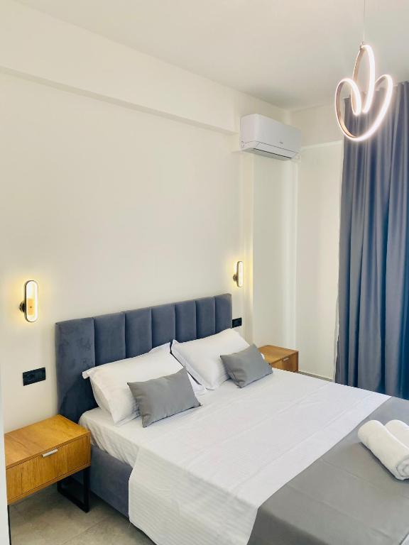 Postel nebo postele na pokoji v ubytování Maor Hotel