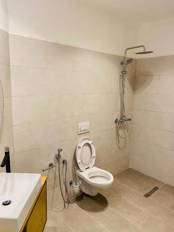 Koupelna v ubytování Maor Hotel