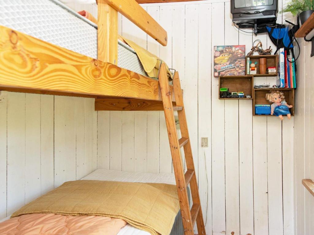 Postel nebo postele na pokoji v ubytování Holiday home Hovborg XI