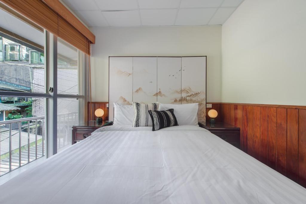Voodi või voodid majutusasutuse Jiufen The Dragon B&B toas