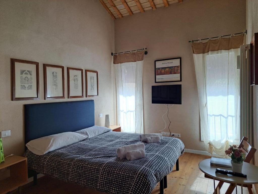 Postel nebo postele na pokoji v ubytování R&B Il Cerchio