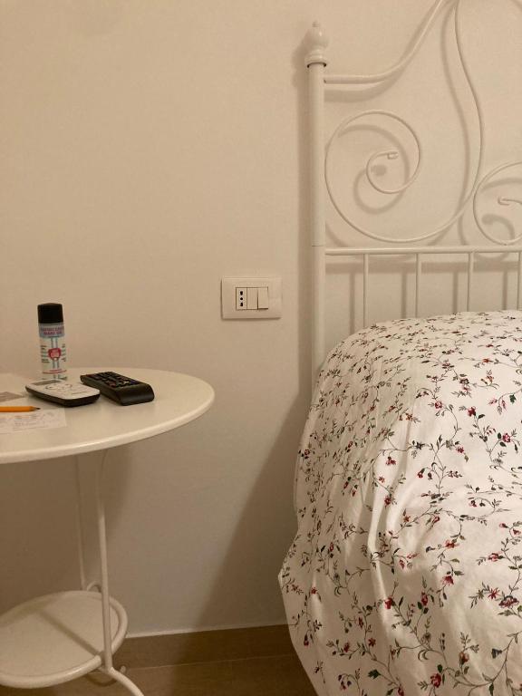 Postel nebo postele na pokoji v ubytování A Suata