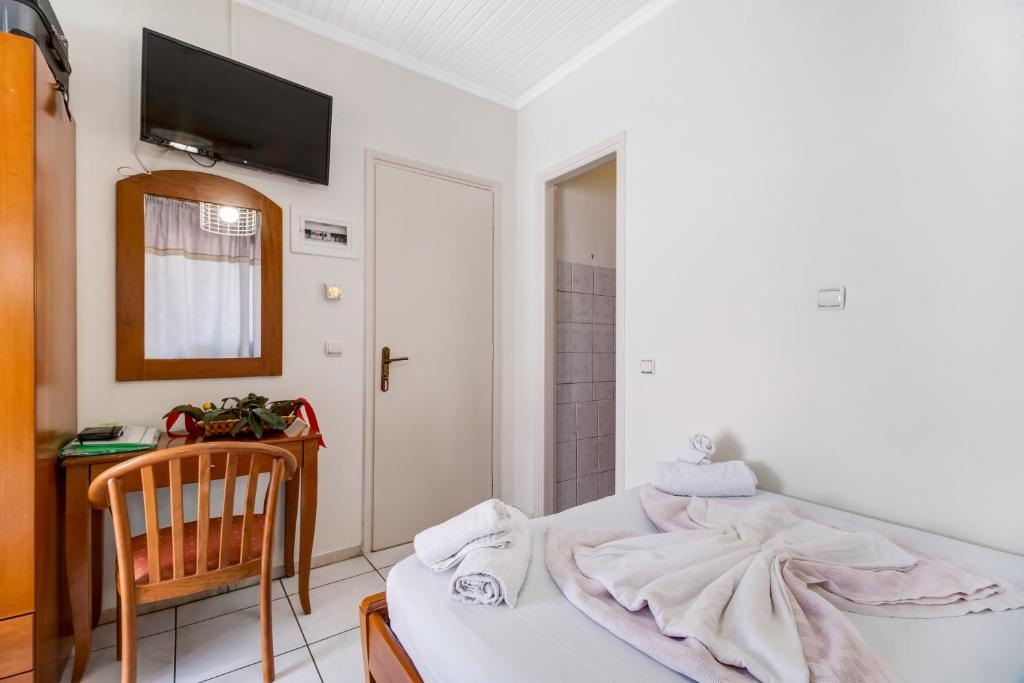 A bed or beds in a room at Nikiana Club - Studio 10