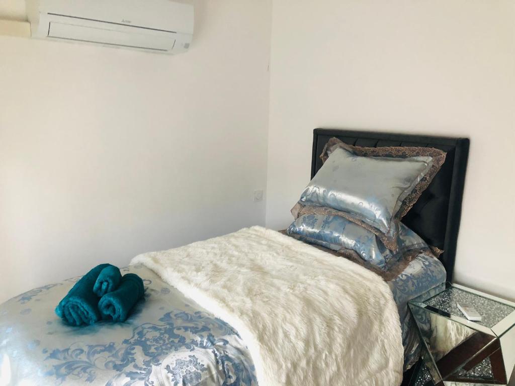 Posteľ alebo postele v izbe v ubytovaní Saint dénis Appartement 1