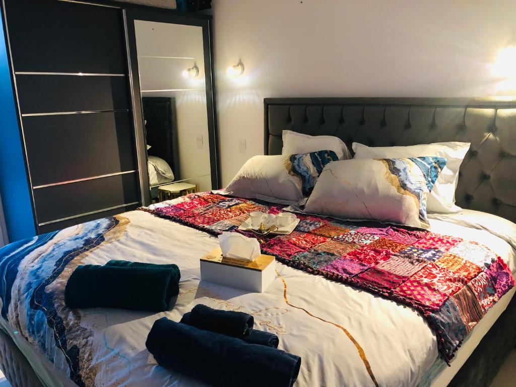 Posteľ alebo postele v izbe v ubytovaní Saint dénis Appartement 1