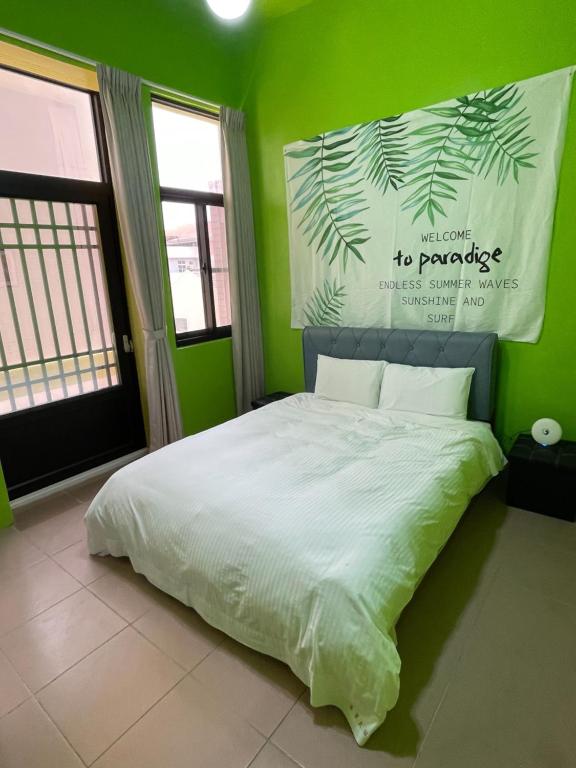 Postel nebo postele na pokoji v ubytování Chunfa B&B