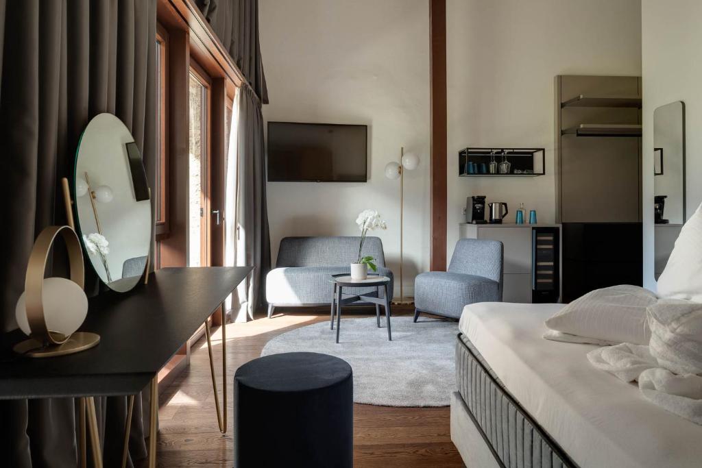 Posteľ alebo postele v izbe v ubytovaní Ansitz Battisti Suites