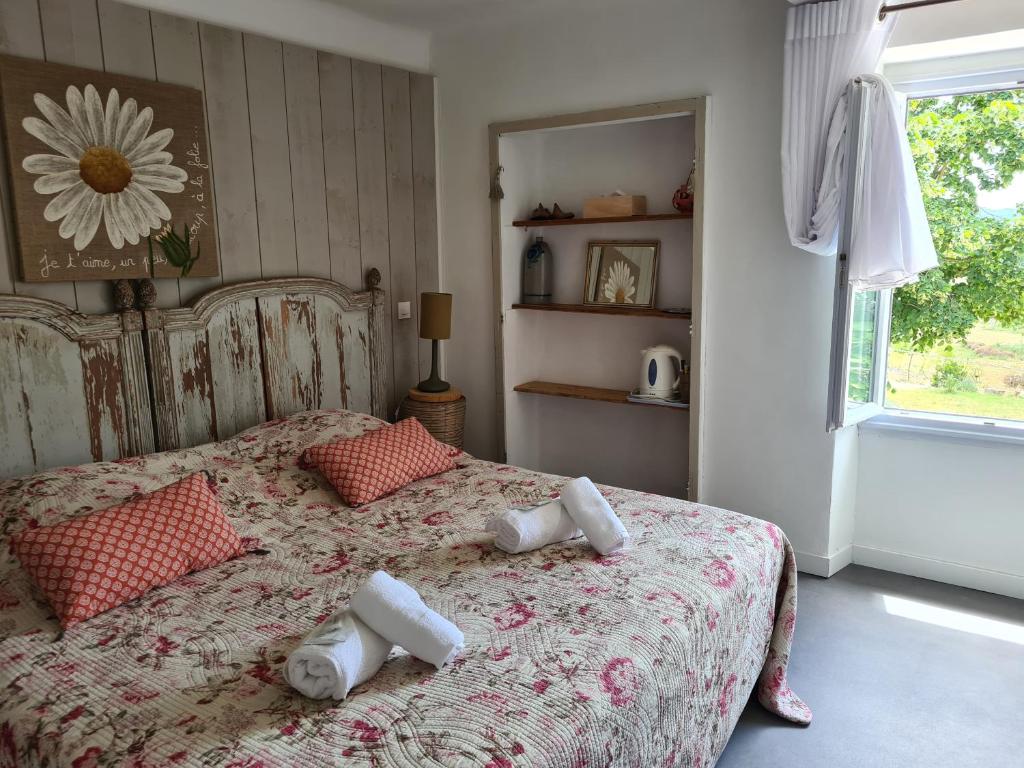 Postel nebo postele na pokoji v ubytování La Ferme Constantin