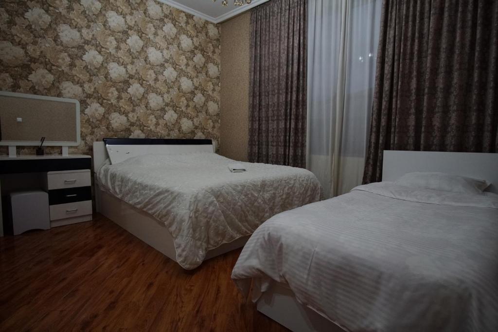 Postel nebo postele na pokoji v ubytování Lile