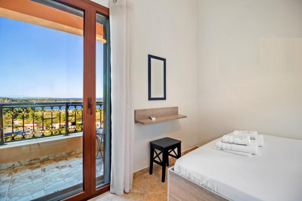 A bed or beds in a room at Seaview Villas
