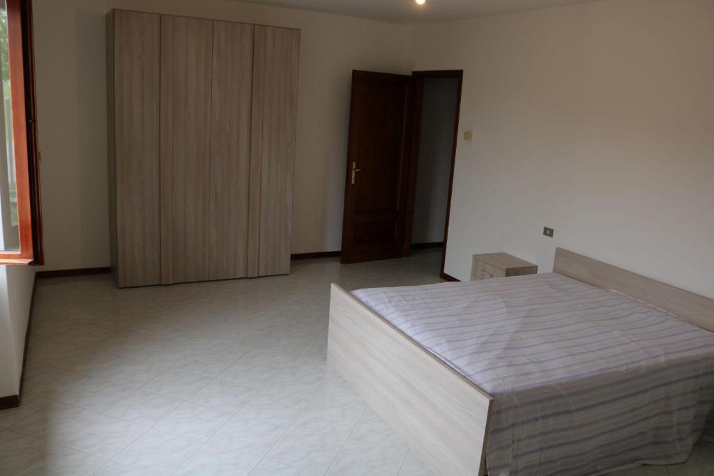Postel nebo postele na pokoji v ubytování Foresto Case Vacanza
