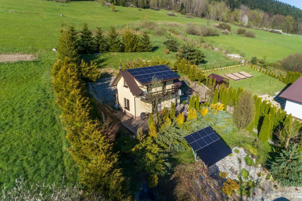 an aerial view of a house with solar panels at Dom Kamianna in Kamianna