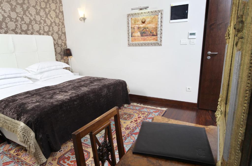 Posteľ alebo postele v izbe v ubytovaní Boutique Hotel Vela Vrata