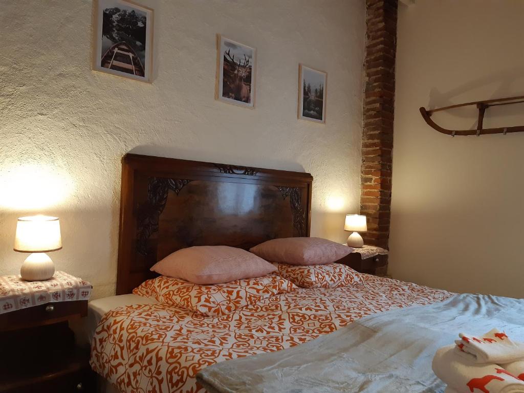 Postel nebo postele na pokoji v ubytování BnB Ferme Beauregard Les Pyrénées