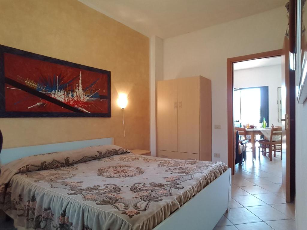 Postel nebo postele na pokoji v ubytování agriturismo heaven trilocale 1