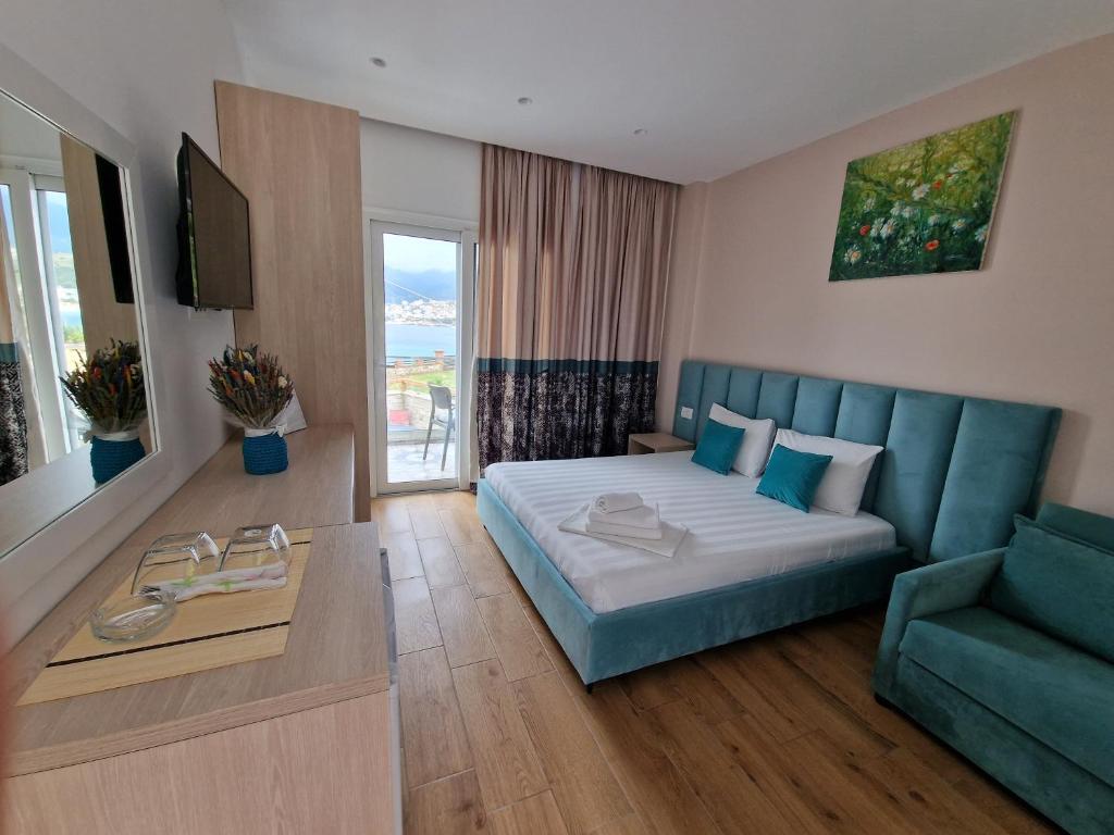 Postel nebo postele na pokoji v ubytování Seaside Hotel