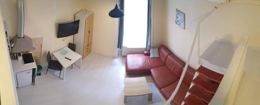 Televízia a/alebo spoločenská miestnosť v ubytovaní Melisa Apartment