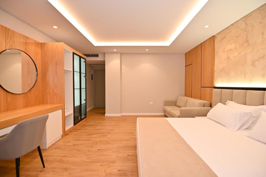 Uma cama ou camas num quarto em Hotel Zanzi