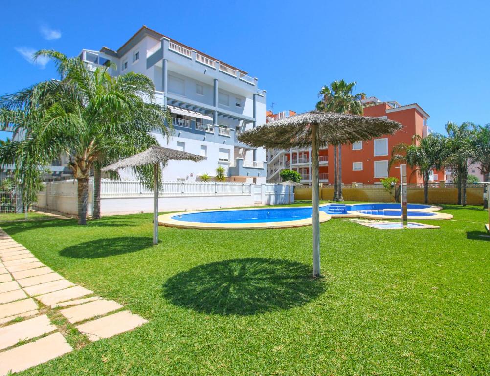 Bazén v ubytování Atico Rincon de Denia nebo v jeho okolí
