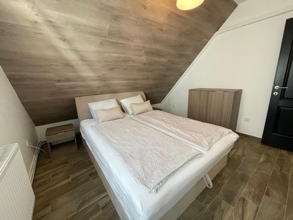 Postel nebo postele na pokoji v ubytování New Beachapartman