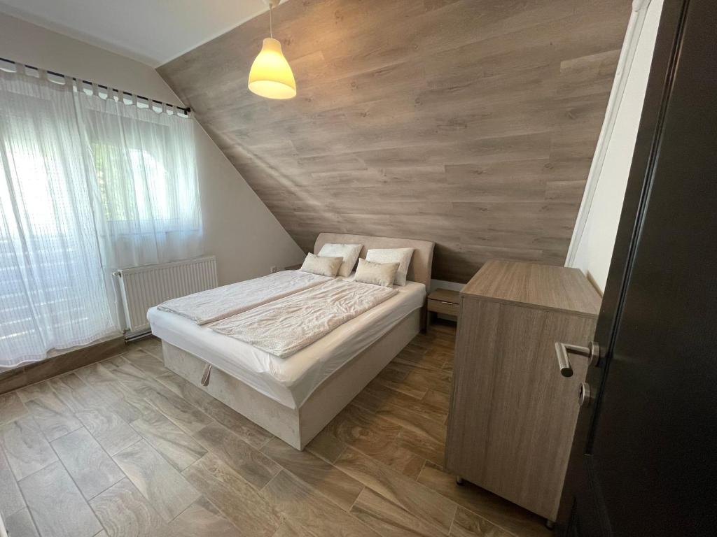Postel nebo postele na pokoji v ubytování New Beachapartman