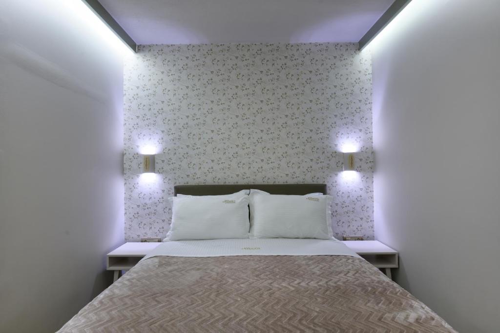 Postel nebo postele na pokoji v ubytování Álbero Hotel