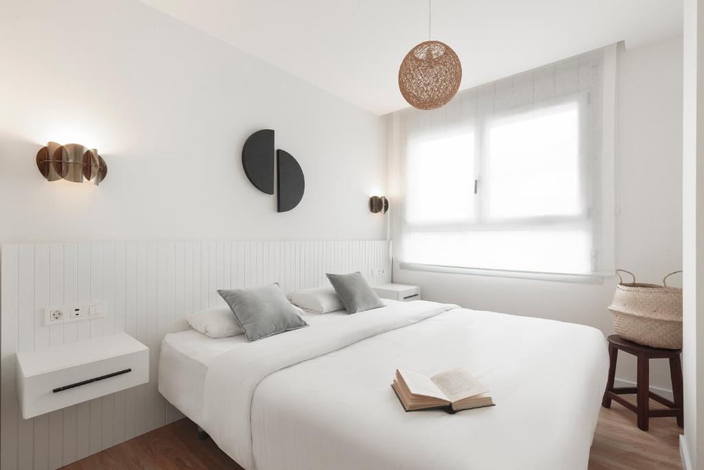 Posteľ alebo postele v izbe v ubytovaní Port Forum Apartments by Olala Homes
