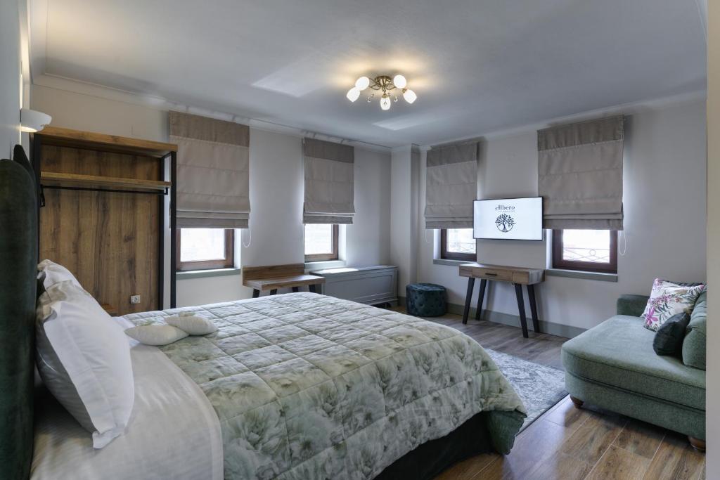 Postel nebo postele na pokoji v ubytování Álbero Hotel
