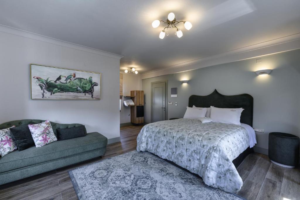 Postel nebo postele na pokoji v ubytování Álbero Hotel