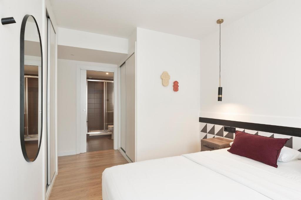 Posteľ alebo postele v izbe v ubytovaní Port Forum Apartments by Olala Homes