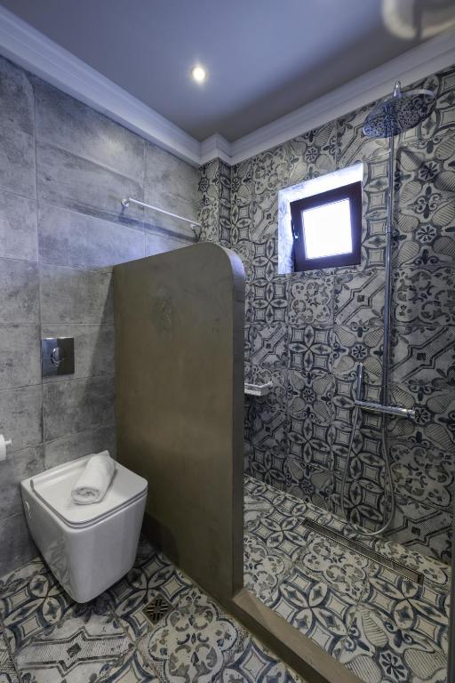 Koupelna v ubytování Álbero Hotel