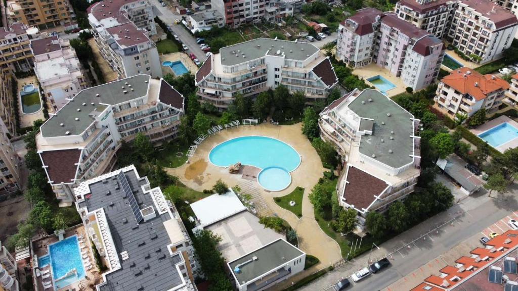 an aerial view of a city with a swimming pool at Kims One-bed Apart for rent at Sunny Beach Resort in Sunny Beach