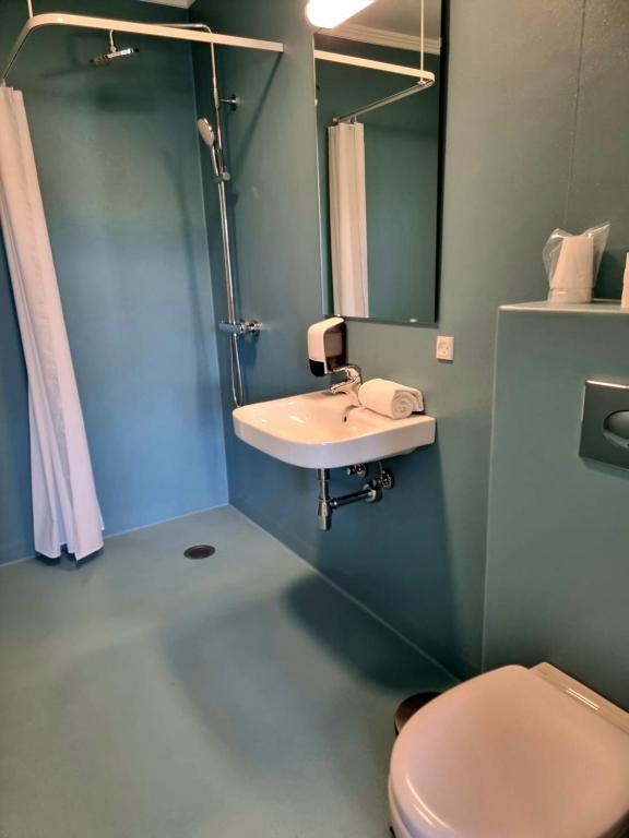 Koupelna v ubytování Skovsgård Hotel