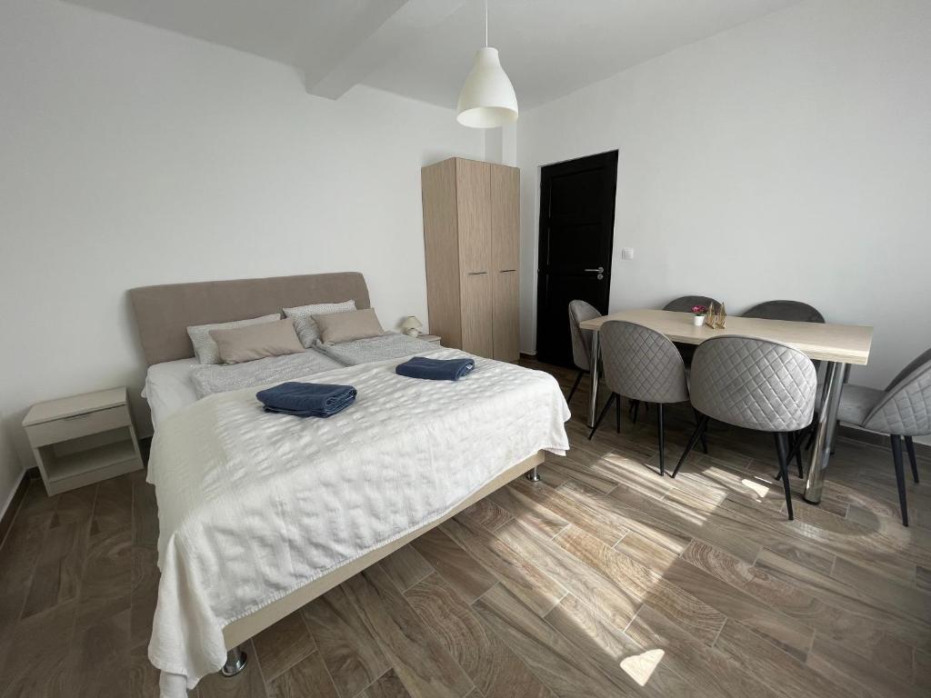 Postel nebo postele na pokoji v ubytování New Beachapartman