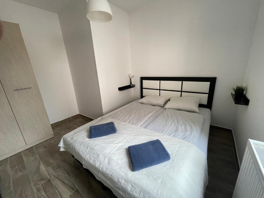 Postel nebo postele na pokoji v ubytování New Beachapartman