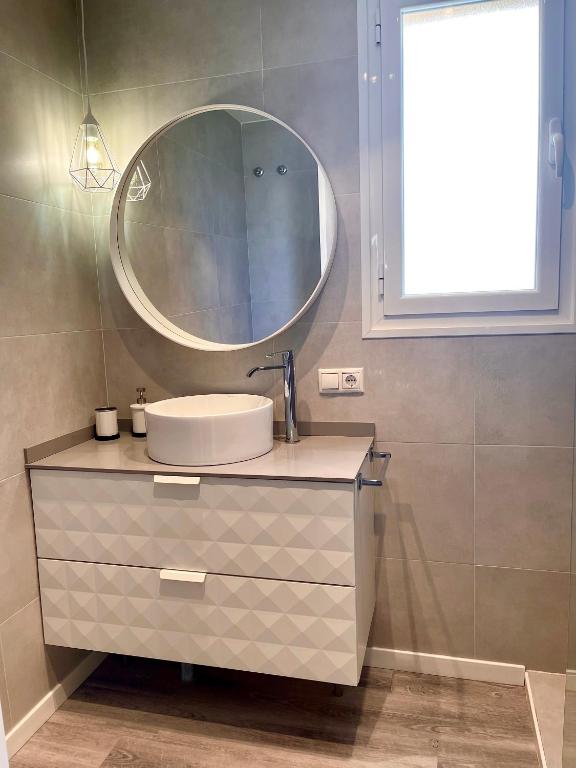 Koupelna v ubytování Bonito apartamento con piscina
