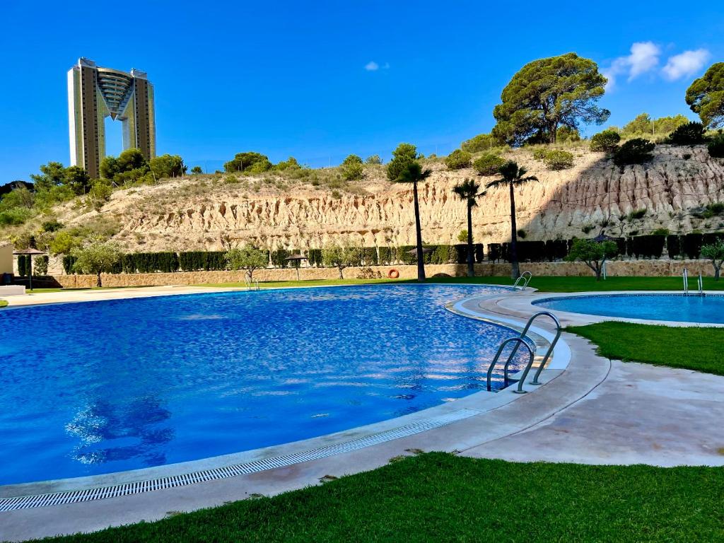 Bazén v ubytování Bonito apartamento con piscina nebo v jeho okolí