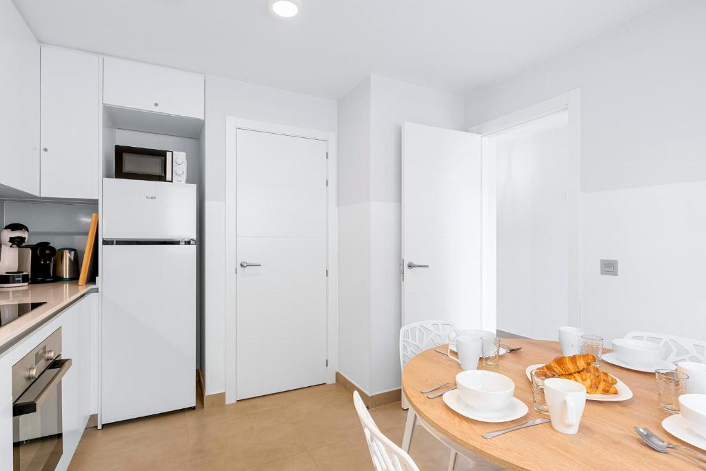 Kuchyň nebo kuchyňský kout v ubytování MEDANO4YOU Cabezo Residence